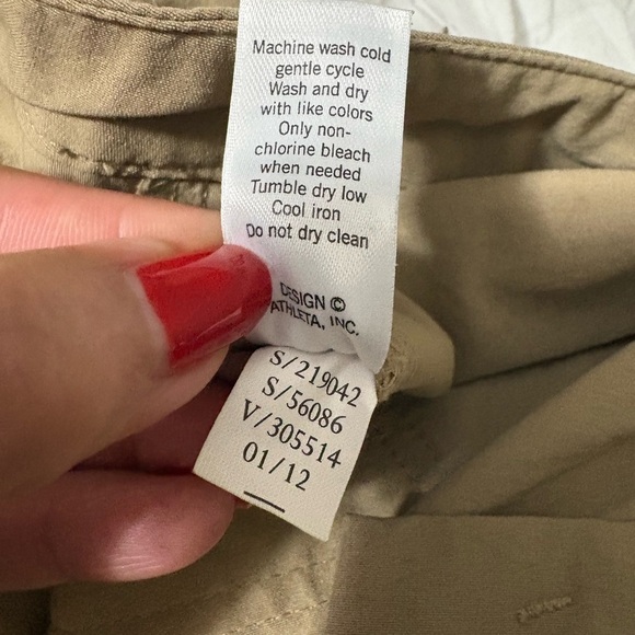 Woman’s Athleta Nylon Tan Cargo Pants. 
Zipper, snap waist and drawstring. - Picture 8 of 16